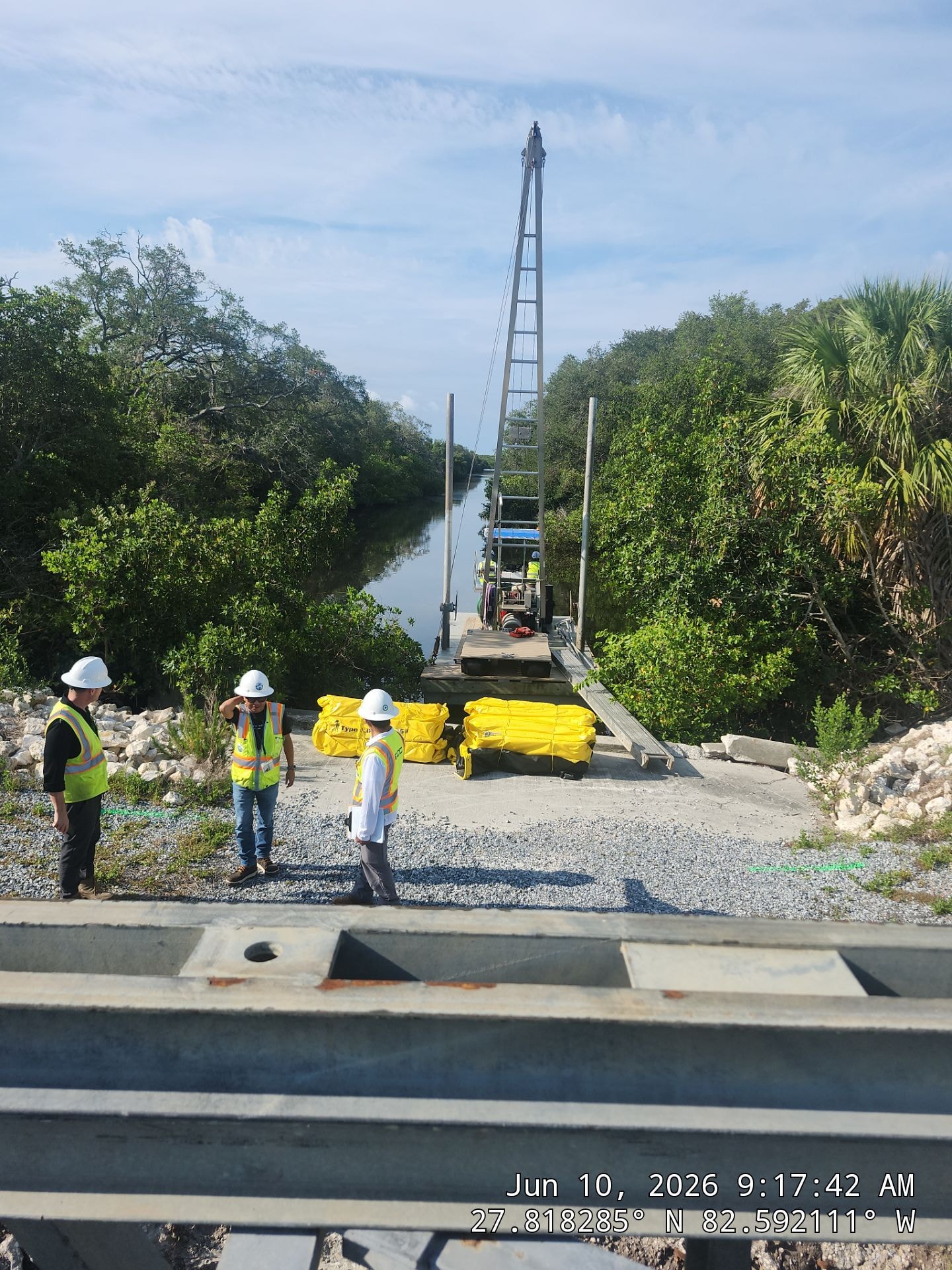 Marine safety sign installation at waterfront dock